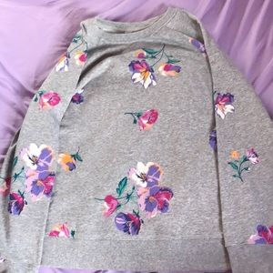 a gray floral sweater